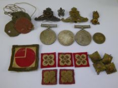 A Miscellaneous collection of Military Badges including collar pips, cap badges, buttons, coins, dog