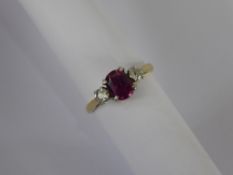 A Lady's Antique 18 ct Yellow Gold and Platinum Three Stone Ruby and Diamond Ring, the ruby approx 7