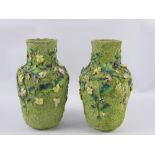 A Pair of Thomas Bevington Moss Ware Vases, with textured green body and floral design in relief,