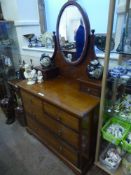 An Edwardian Mahogany Dressing Table, two short drawers, two long drawers, upper gallery with