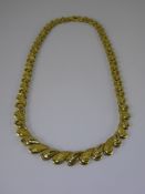 A Lady's 14 ct Yellow Gold Shell Form Fancy Necklace, approx 42 cms, approx 37 gms.