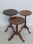 Three Circular Wine Tables, tripod base, approx 17 x 50 cms, 30.5 x 46 cms; 30 x 52 cms