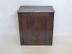 An Antique Stained Oak Cupboard, approx 34 x 55 x 58 cms