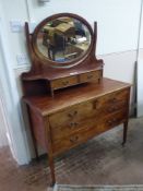 An Edwardian Dressing Table, two short drawers with two long drawers, raised gallery with two