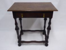 An Antique Oak Occasional Table, the table having single drawer, on turned legs with stretchers on