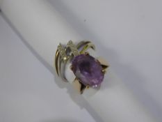 A Lady's 9ct Yellow Gold and Amethyst Ring, size K, the amethyst 4 x 10 mm, approx 4.6 gms and A