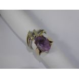 A Lady's 9ct Yellow Gold and Amethyst Ring, size K, the amethyst 4 x 10 mm, approx 4.6 gms and A