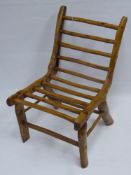 A Hand Crafted Oak and Hawthorn Stick Back Chair.