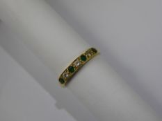 A Lady's 18 ct Yellow Gold Diamond and Emerald Ring, the 4 x 2.25mm emeralds and 13 to 15 pts
