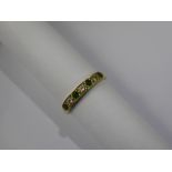 A Lady's 18 ct Yellow Gold Diamond and Emerald Ring, the 4 x 2.25mm emeralds and 13 to 15 pts