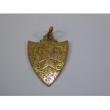 A 9ct Yellow Gold Medallion, awarded to Mr P Baker for First Aid Challenge Shield,dated 1911, approx