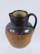 An Antique Lambeth Ware Treacle Glazed Harvest Jug, approx 17 cms