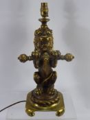 A Brass Lamp Base in the form of a Rampant Lion, approx 40 cms