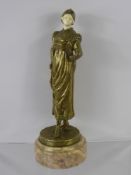 Georges Omerth (1895-1925) Gilt Bronze and Ivory Figurine, raised on a circular rose marble