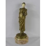 Georges Omerth (1895-1925) Gilt Bronze and Ivory Figurine, raised on a circular rose marble