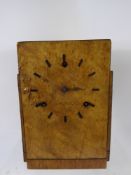 An Art Deco Bird's Eye Veneer Mantel Clock, approx 20 x 26 cms. (wf)