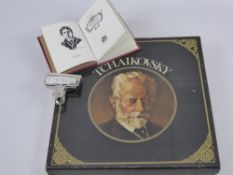 A Box of Tchaikovsky Vinyl Records, within the box is a printed edition of Poems from Reading Gaol