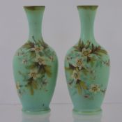 A Pair of Victorian Opaline Vases, hand painted with floral spray, approx 19 cms