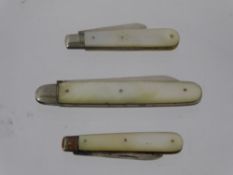 Three Mother of Pearl and Silver Fruit Knives. (3).