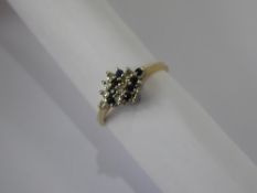 A Lady's 9 ct Yellow and White Gold Diamond and Sapphire Ring, size M, wt approx 1.6 gms.