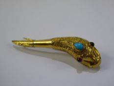 An Antique Lady's 14 ct Yellow Gold, Ruby and Turquoise Brooch, the brooch in the form of a