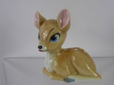 A Wade Disney Figurine of Bambi, approx 10.5 cms, with factory marks to base.