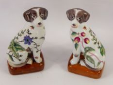 A Pair of Chinese Ceramic Spaniel Figurines, hand painted with fruit and insects, approx 22 cms,