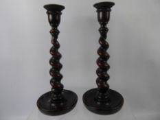 A Pair of Turned Oak Candlesticks, approx 29 cms