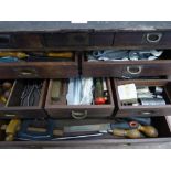 An Antique Tool Chest having Ten Draws, containing miscellaneous Tools & Measuring Equipment