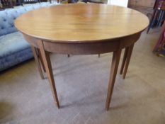 A Mahogany Dining Table, with two extension leaves. (2)