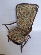 An Ercol Grandmother Chair, spindle back on straight legs.