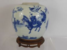 An Antique Chinese Blue and White Ginger Jar, depicting figures at leisure in a garden, approx 24