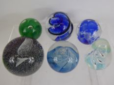 A Quantity of Glass Paperweights, including Caithness 'Zephyr', Caithness 'Sea Gem' amongst