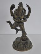 A Bronzed Hindu Figurine of Lord Shiva and Goddess Parvati, raised on a circular lotus flower