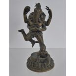 A Bronzed Hindu Figurine of Lord Shiva and Goddess Parvati, raised on a circular lotus flower