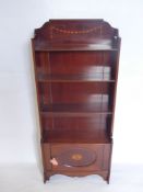 A Regency-Style Book Case, with three shelves and cupboard beneath, decorative floral inlay,