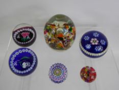A Quantity of Glass Paperweights, including Perthshire, 'Snowdrop', 'Lily', a small multi cane, a