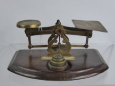 A Set of Vintage Brass Postal Scales, with a small quantity of weights.