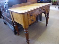A Light Oak Dressing Table, with two drawers to either side, raised on turned legs, approx 100 x