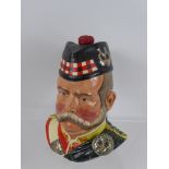 A Royal Doulton 25 Year Old Grant's Scotch Whisky Character Decanter, together with a Moorcroft