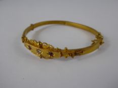 A Lady's 15 ct Gold Edwardian Diamond and Ruby Bracelet, the bracelet having filigree work to