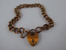 An Antique 9 ct Rose Gold Bracelet, with heart-shaped locket, approx wt 10 gms.
