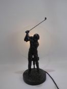 A Contemporary Composite Lamp Base, depicting a golfer in full swing, horizontal opaque glass