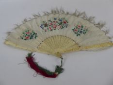 A 19th Century Chinese Ivory and Feather Fan, hand painted with flowers and butterflies to one side,