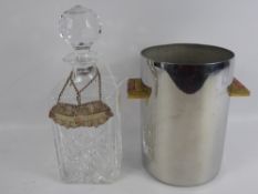 A Guy Degrenne Art Deco Ice Bucket, together with a cut-glass decanter and two silver -plated liquor