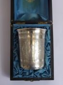 An Antique Belgian Solid Silver Christening Beaker, the beaker having fish scale engraving with