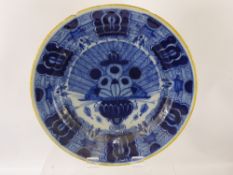 An 18th Century Dutch Delft Charger, Peacock design, approx 34 cms dia. (af)