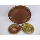 Two Circular Copper and Brass Dishes, signed T.E. Lewis dated 1939, together with an oval hammered