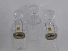 Three Matching Jones Hand-Cut Crystal Glass Decanters, with brandy and port labels.(3)