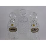 Three Matching Jones Hand-Cut Crystal Glass Decanters, with brandy and port labels.(3)